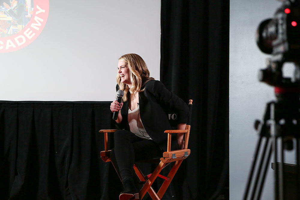 NYFA Acting screening Q&A camera view of woman laughing in directors chair.