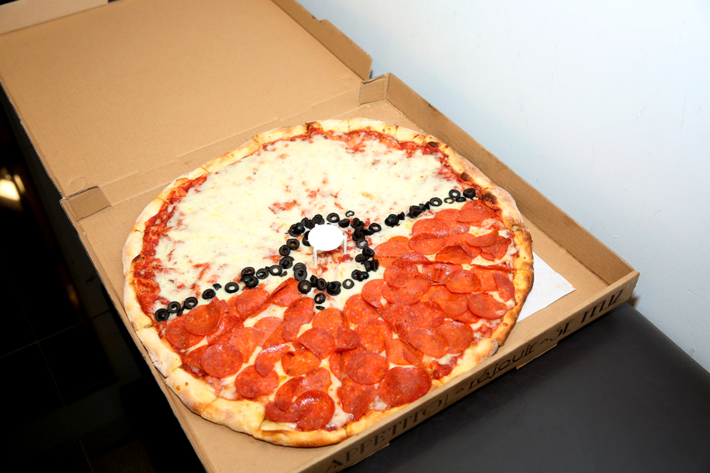 Pokeman shaped pepperoni pizza