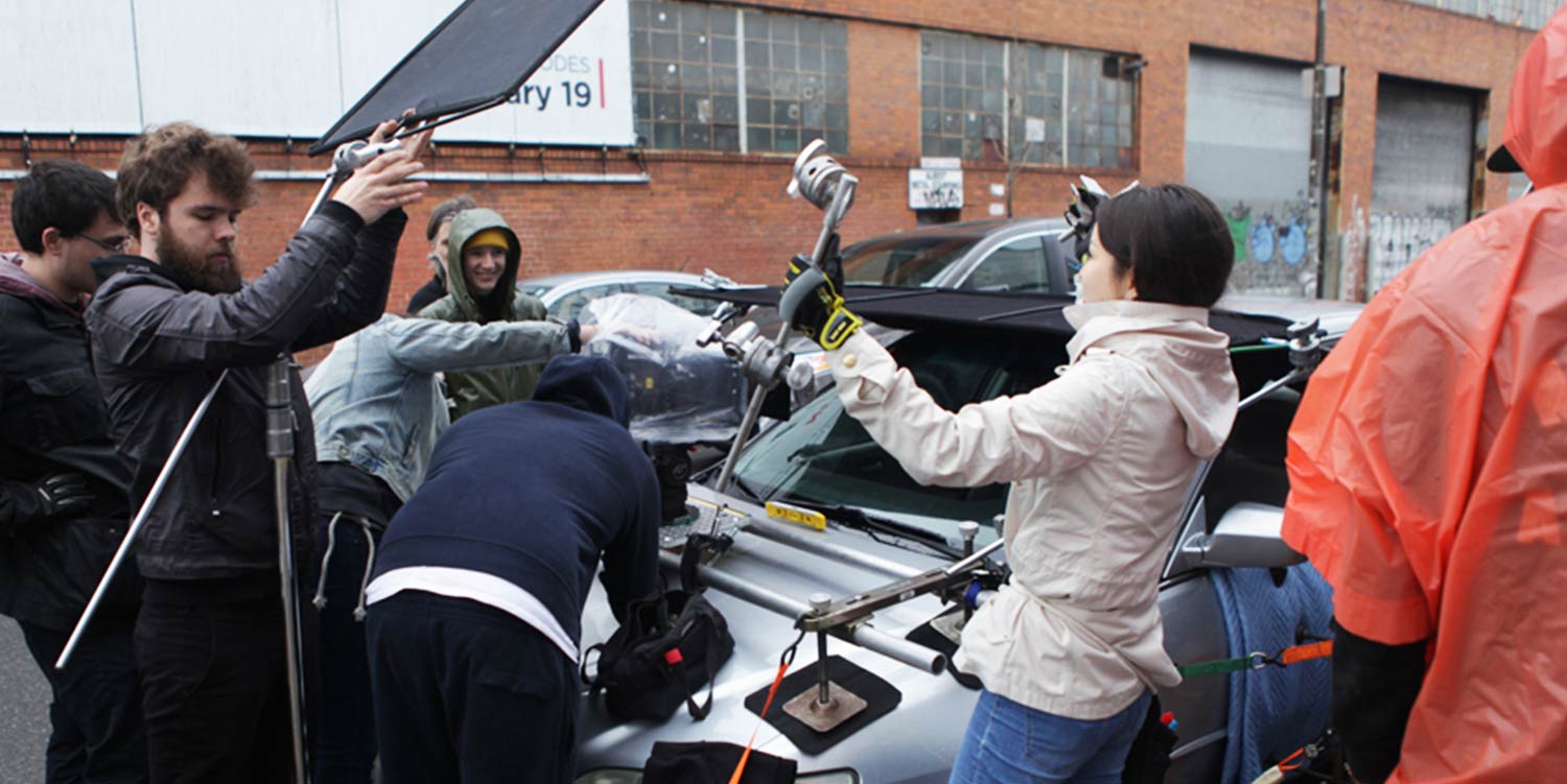 Crew filming a scene on a set