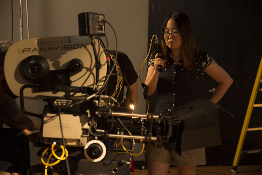 Woman setting up Panavision camera