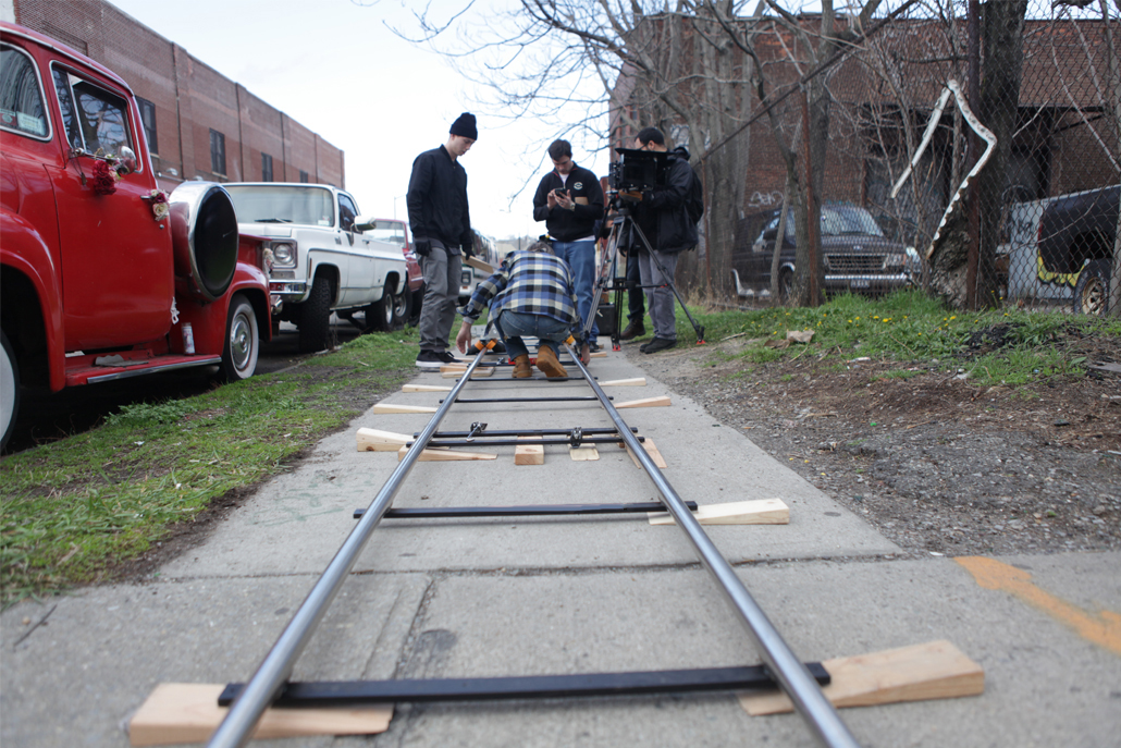 Crew members setting up set structure