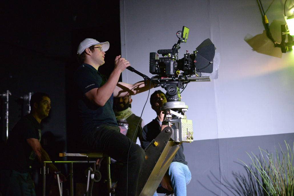 Man operating a large camera