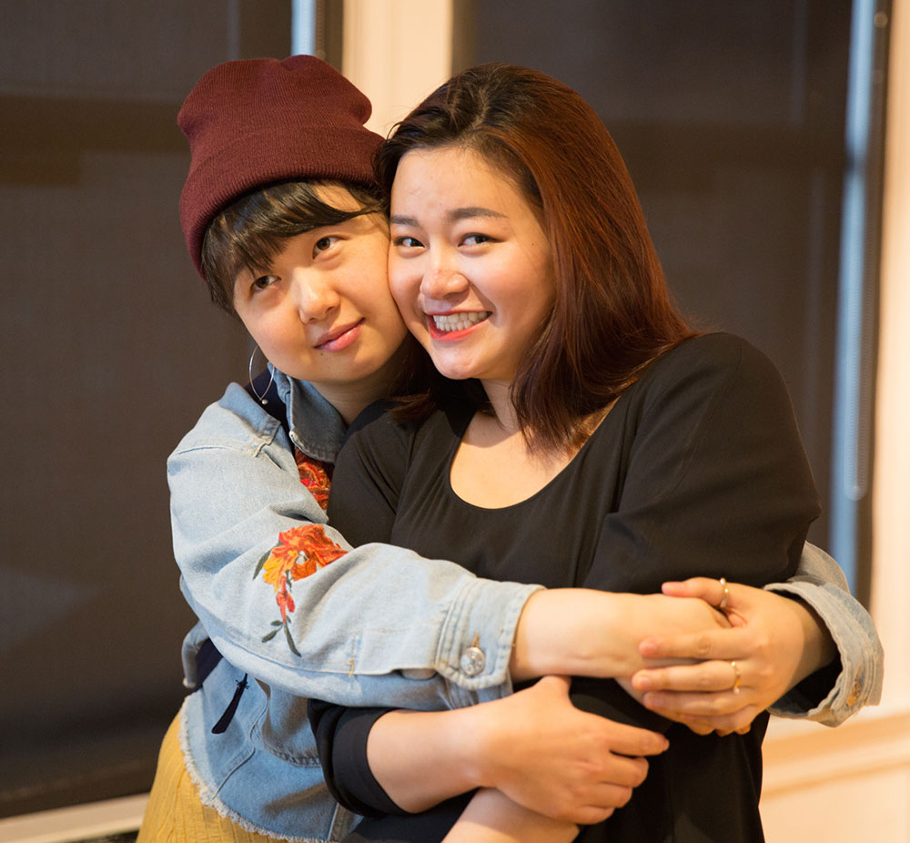 two people at the 2016 nyfa fall film commencement ceremony