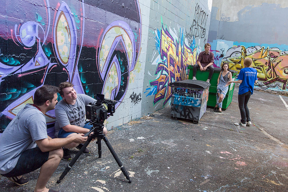 nyfa students filming scene in alley