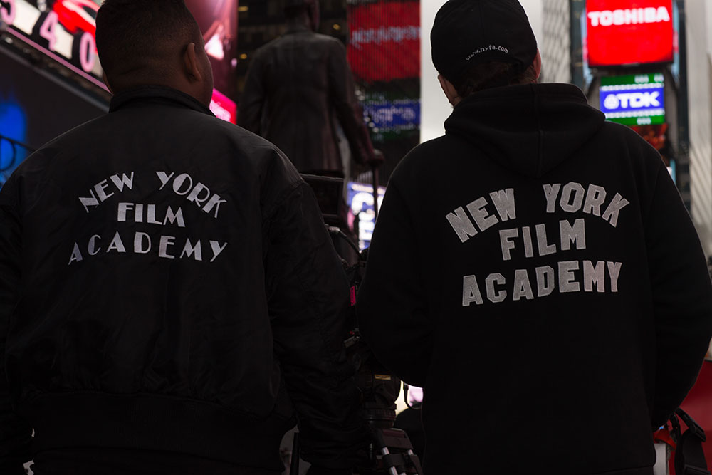 two students in new york film academy jackets