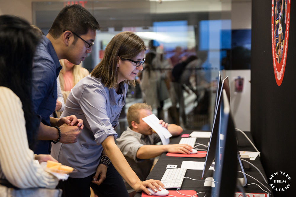 People working on desktops