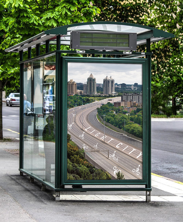 A billboard of the bike highway on a bus stop