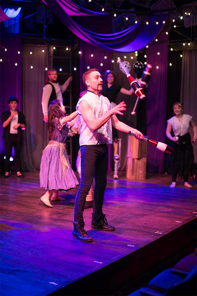 man juggling in nyfa carousel