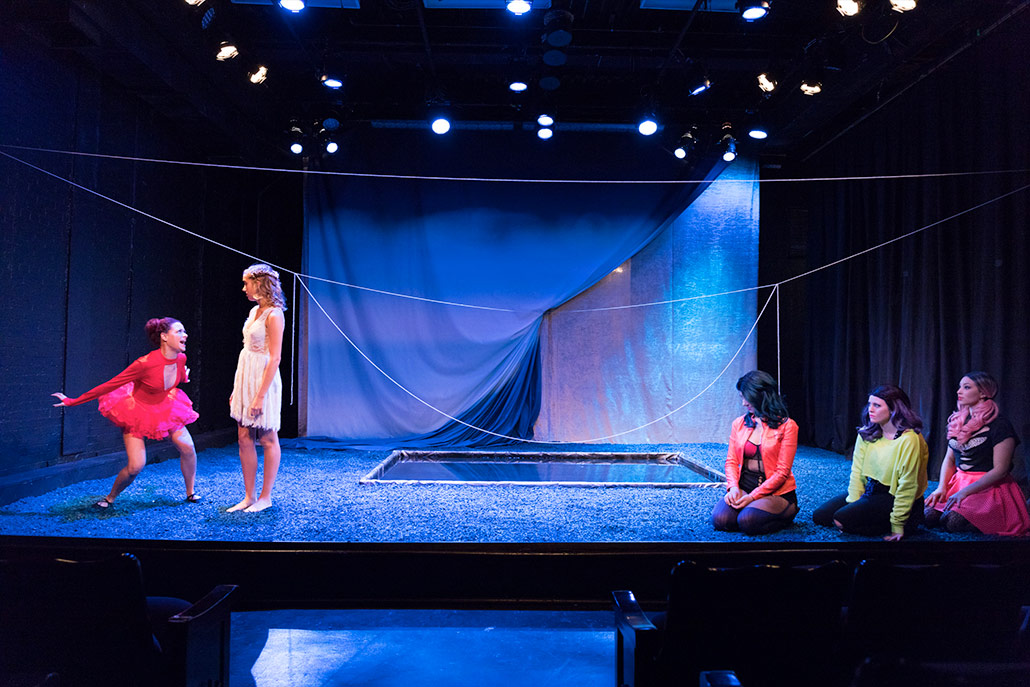 New York FIlm Academy musical theatre ensemble performing in Eurydice, in blue light.