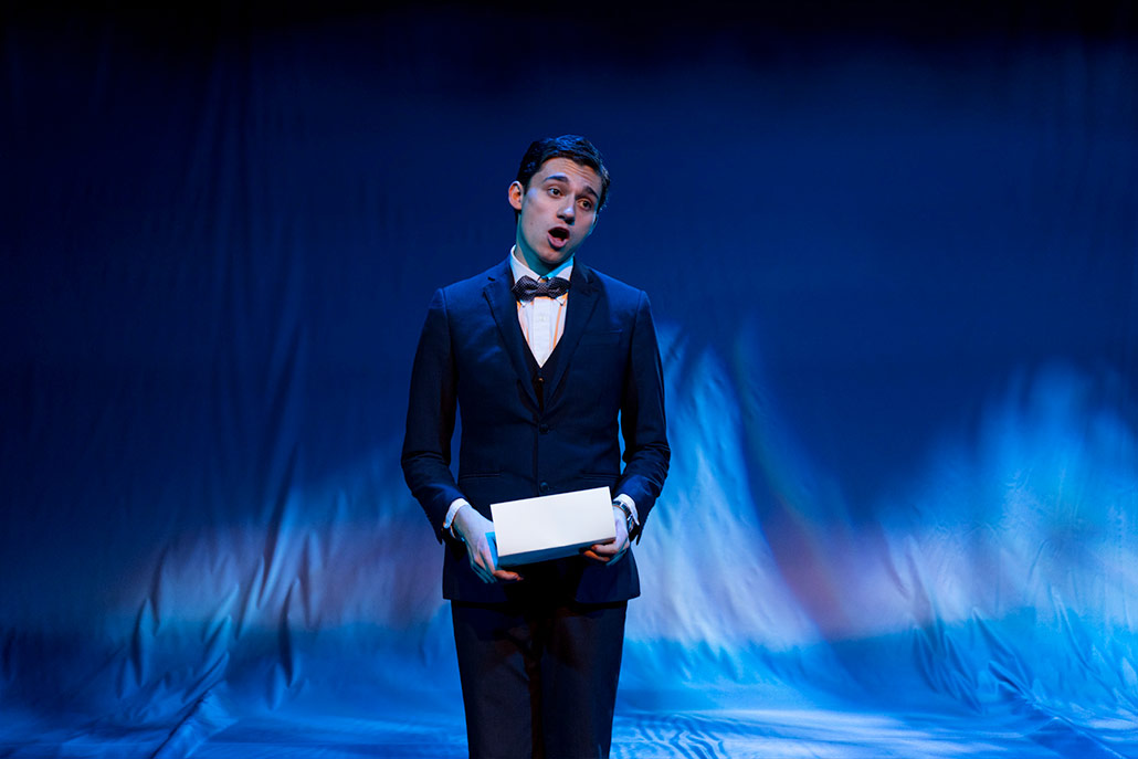 NYFA musical theatre student in black suit and bow tie sings in Eurydice.