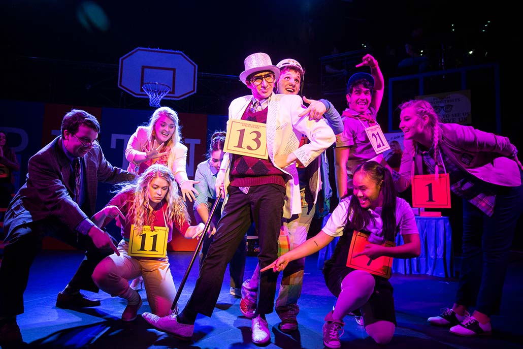 NYFA student ensemble poses for grand finish of musical number in Spelling Bee.