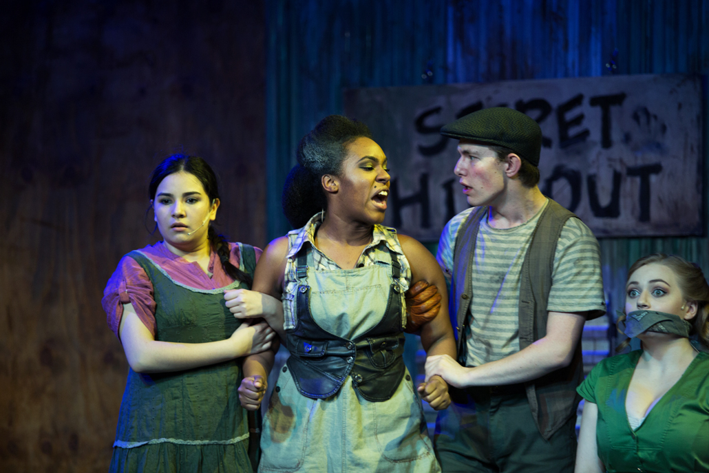 Urinetown Cast Hold Member Back