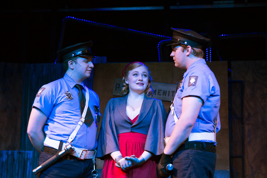 Two Urinetown Police Officers