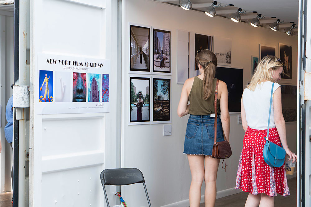 Two women at new york film academy photo exhibit