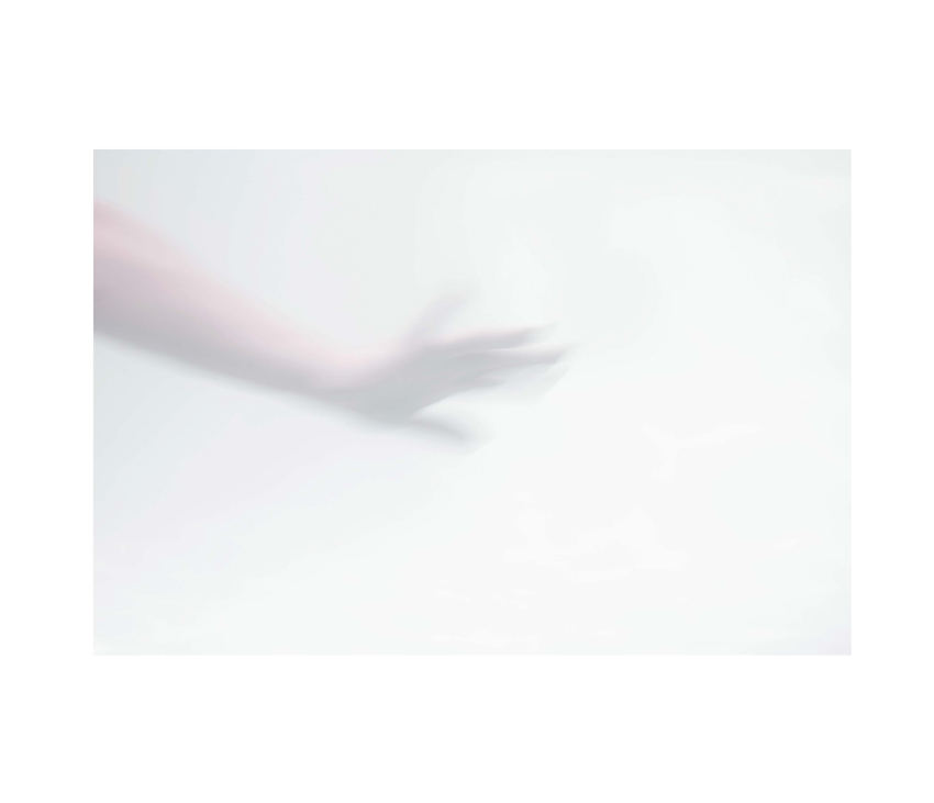 ﻿Blurred open hand on white background