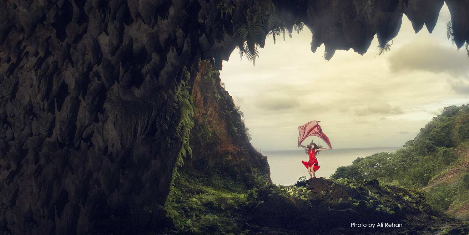 ﻿Animation of girl waving fabric on top of a mountain