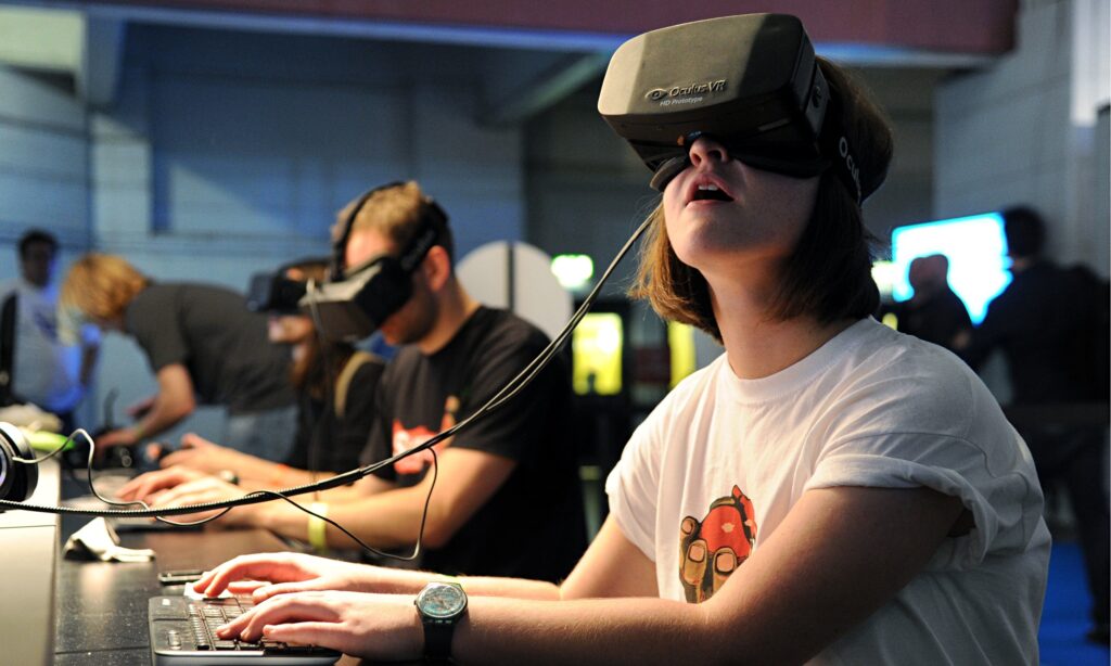 Girl tries on Oculus Rift