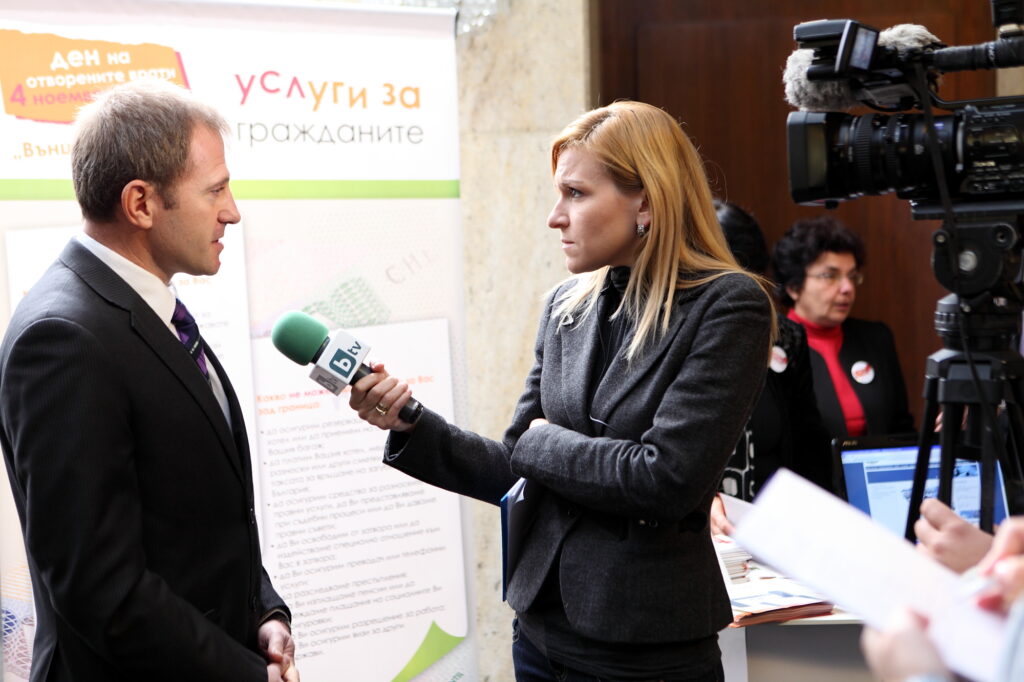 Broadcast Journalist Gabriela Naplatanova interviews on camera