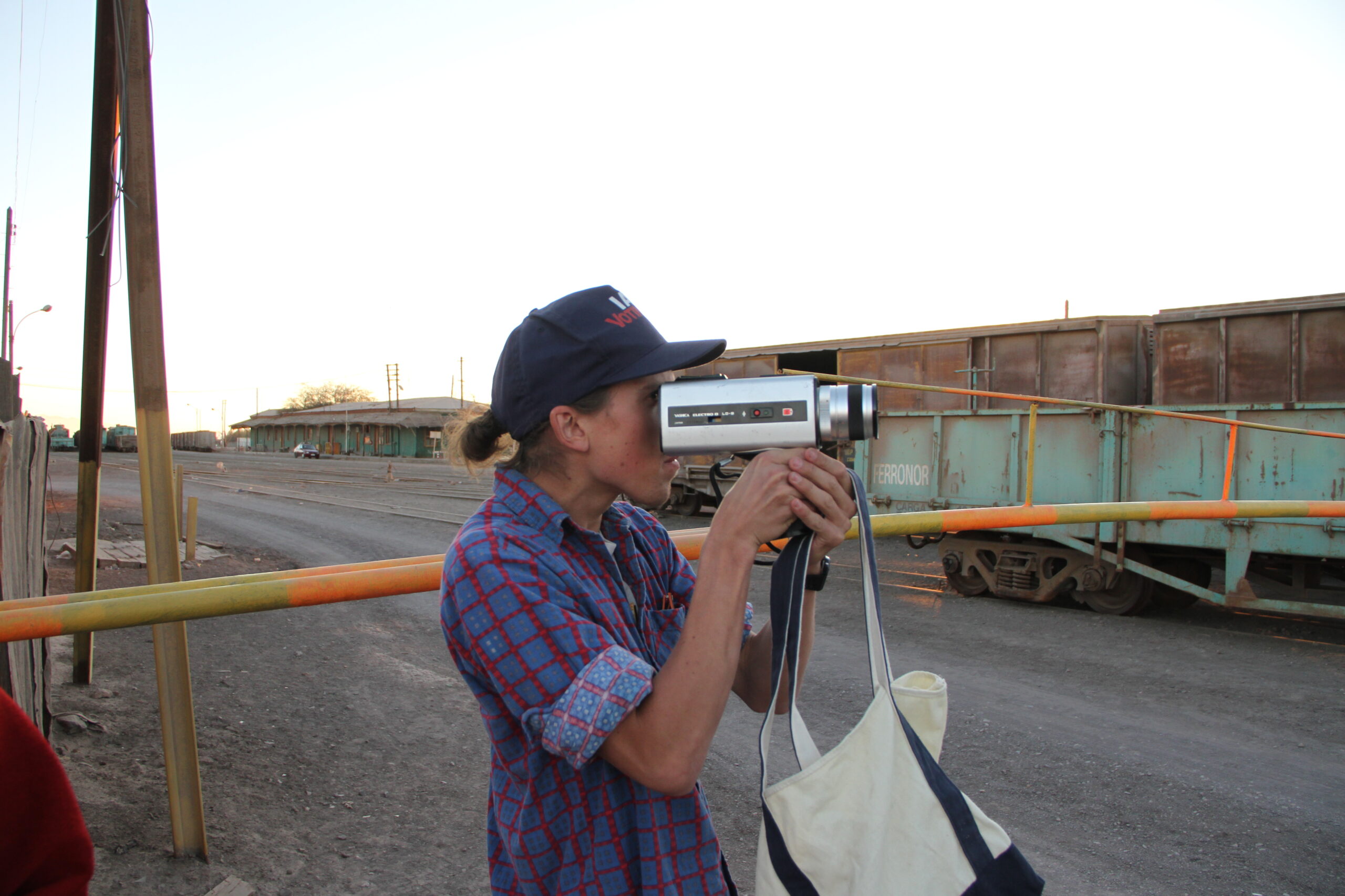 Documentary filmmaker Paul Gallasch filming with camera
