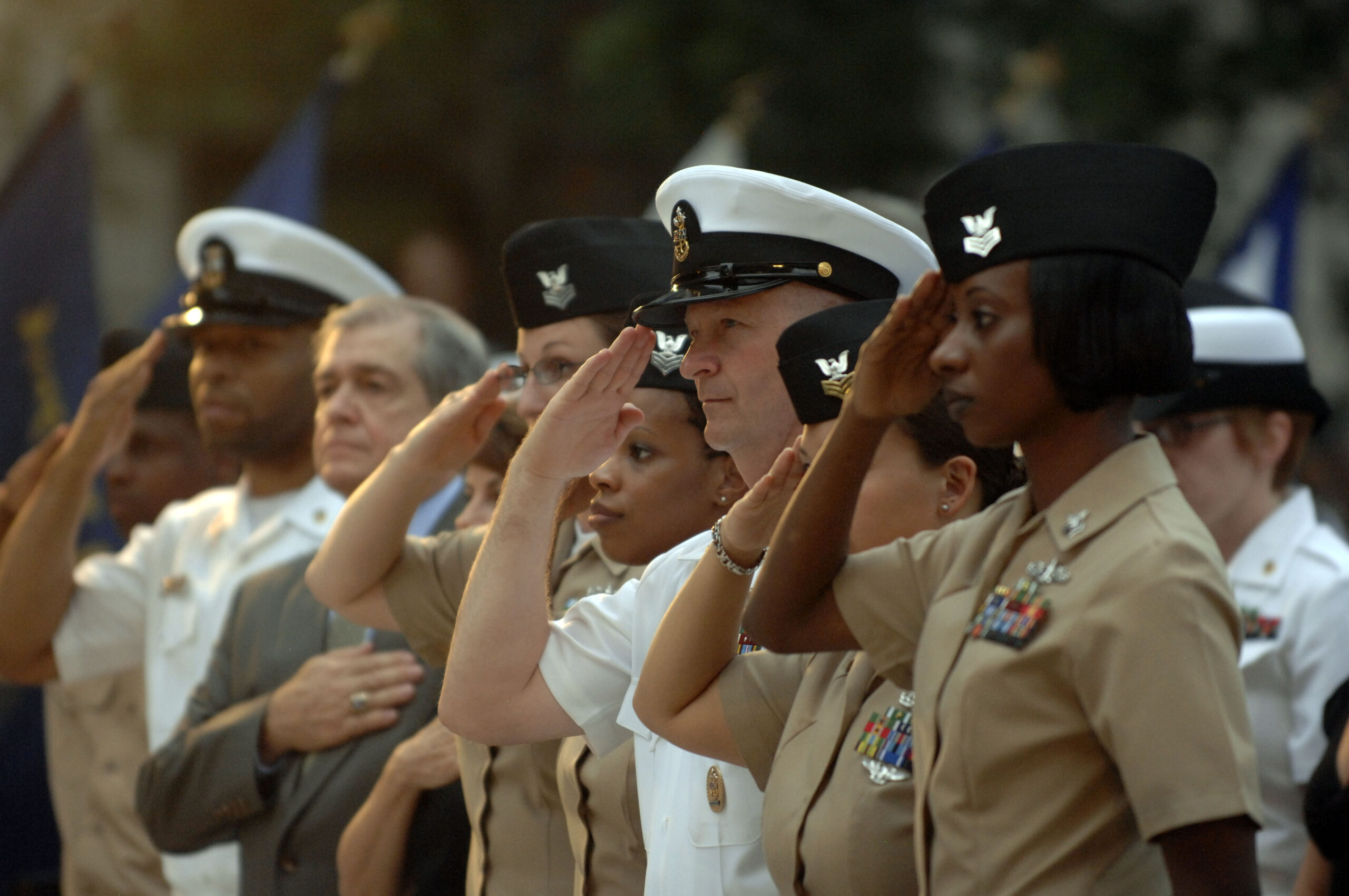 100720-N-4930E-578 WASHINGTON (July 20, 2010) Master Chief Petty Officer of the Navy (MCPON) Rick West, second from right, joins Cryptologic Technician (Technical) 1st Class Cassandra L. Foote, left, Chief of Naval Operations Sailor of the Year; Hospital Corpsman 1st Class Shalanda Brewer, Navy Reserve Sailor of the Year; Hospital Corpsman 1st Class Ingrid Cortez, Fleet Forces Sailor of the Year and Operation Specialist 1st Class Samira McBride U.S., Pacific Sailor of the Year, in saluting the American flag to kick off a night of entertainment provided by the U.S. Navy ceremonial guard and Navy Band at the Navy Memorial in Washington, D.C. (U.S. Navy photo by Mass Communication Specialist 1st Class Abraham Essenmacher/Released)