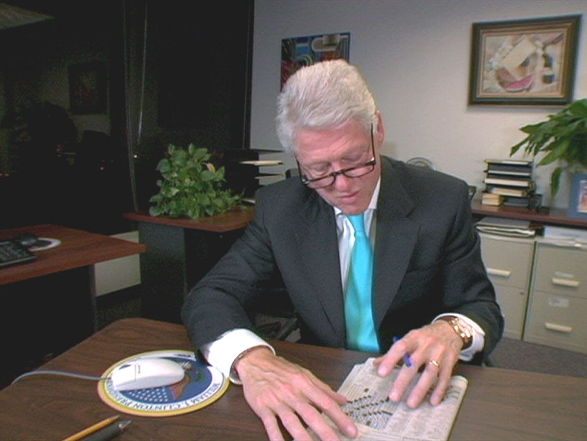 Bill Clinton doing a crossword puzzle in Wordplay